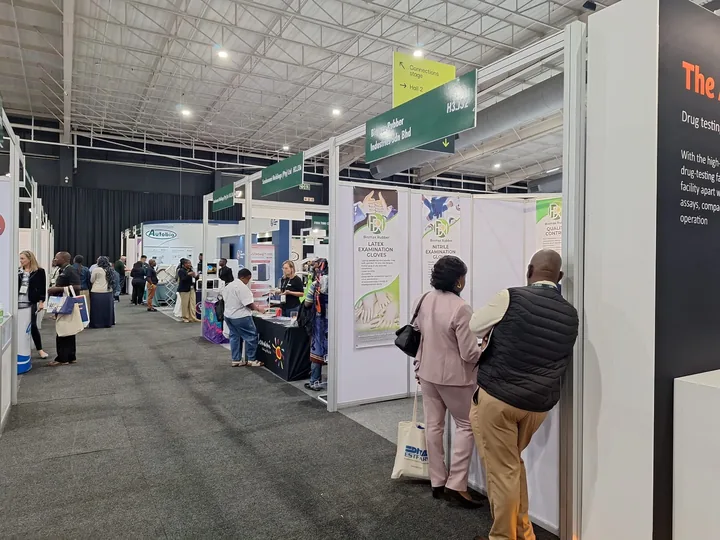 Exhibition aisle at WHX with Pacific Resource Global booth H3.J32 and visitors walking past